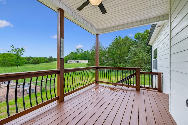 7575 Carthage Hwy, Lebanon, TN 37087 - deck featuring a ceiling fan, a yard, and view of wooded area