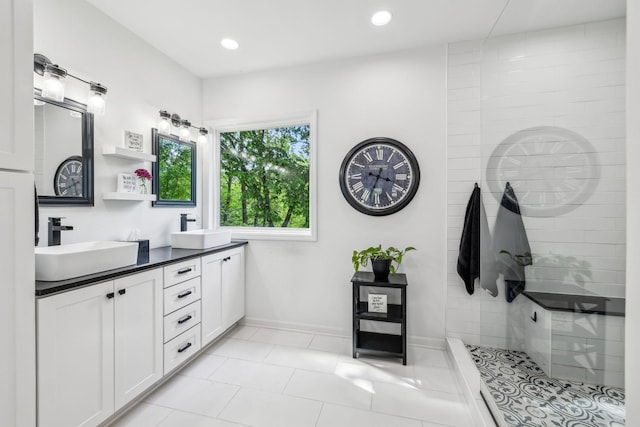 1308 Beech Hollow Dr, Nashville, TN 37211 - bathroom with double vanity, a walk in shower, recessed lighting, tile patterned floors, and baseboards