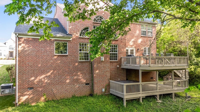 1308 Beech Hollow Dr, Nashville, TN 37211 - back of property with a wooden deck, brick siding, crawl space, and cooling unit