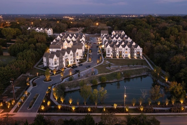 aerial overview of property's location featuring a forest