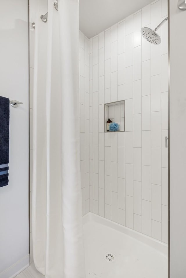 bathroom featuring a stall shower