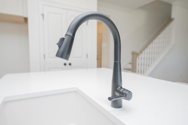 5329 Bridgemore Blvd, Murfreesboro, TN 37129 - detailed view of light countertops, white cabinets, and a sink