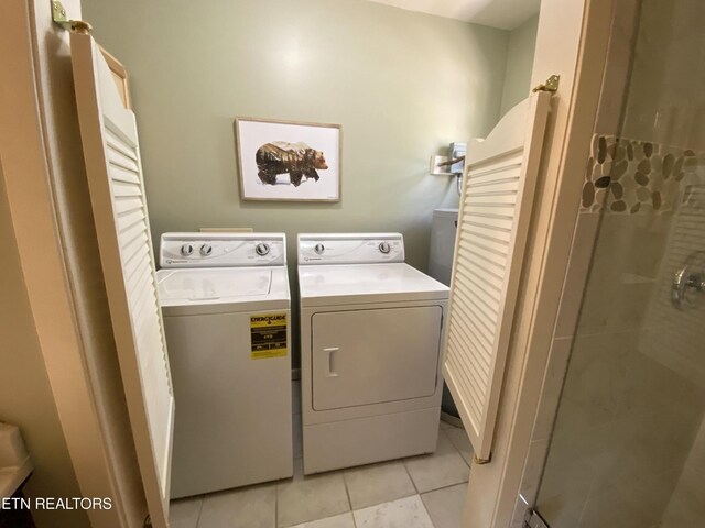 518 Deer Path Ln, Gatlinburg, TN 37738 - laundry room with washing machine and dryer and light tile patterned floors