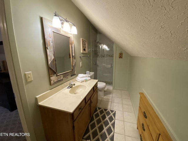518 Deer Path Ln, Gatlinburg, TN 37738 - bathroom with vaulted ceiling, a textured ceiling, a stall shower, toilet, and vanity