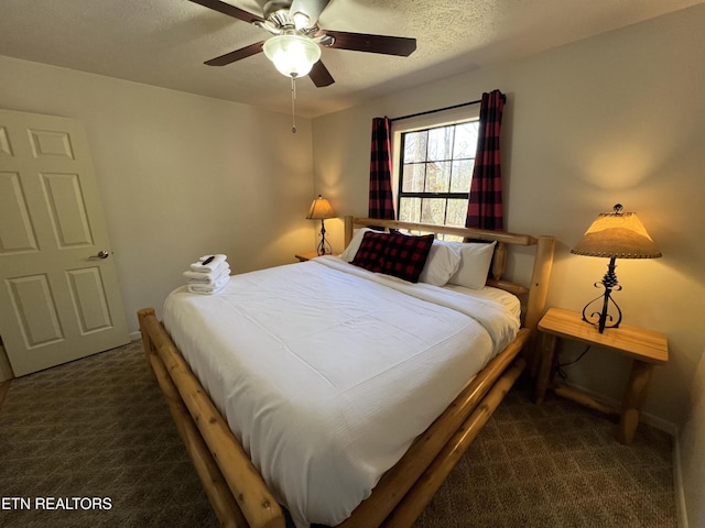 518 Deer Path Ln, Gatlinburg, TN 37738 - bedroom with carpet flooring, a textured ceiling, and ceiling fan
