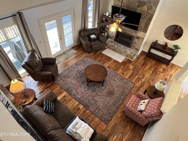 518 Deer Path Ln, Gatlinburg, TN 37738 - living area with wood finished floors, ceiling fan, and a fireplace