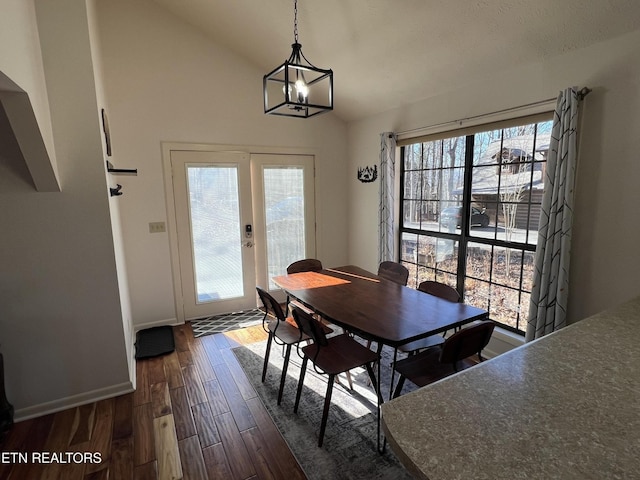 518 Deer Path Ln, Gatlinburg, TN 37738 - dining room with vaulted ceiling, dark wood-style flooring, healthy amount of natural light, french doors, and baseboards