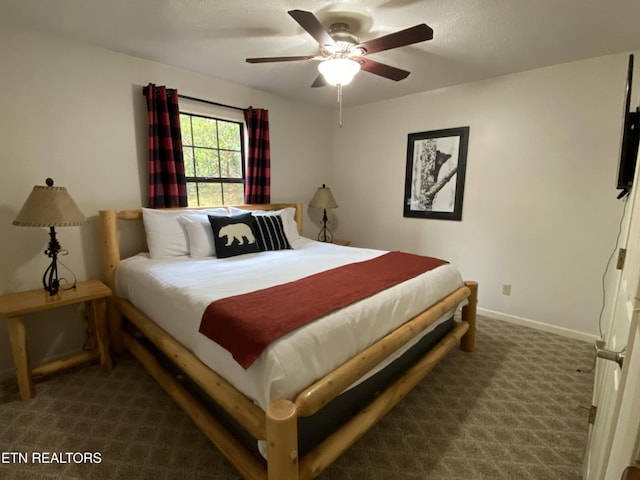 518 Deer Path Ln, Gatlinburg, TN 37738 - carpeted bedroom featuring baseboards and ceiling fan