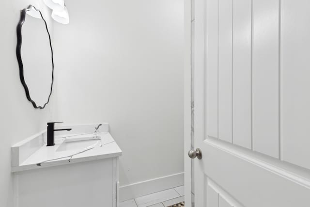 bathroom with vanity and tile patterned floors