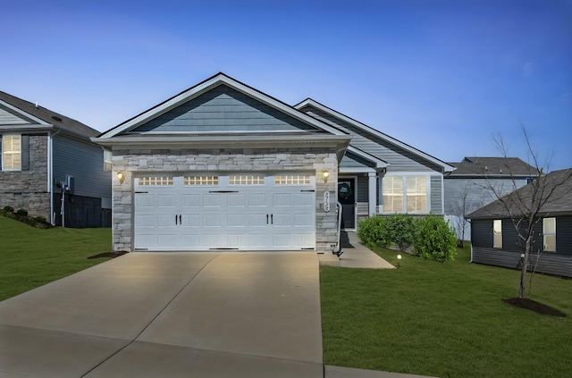 2720 Thornton Grove Blvd, Nashville, TN 37207 - single story home featuring stone siding, a front yard, an attached garage, and concrete driveway