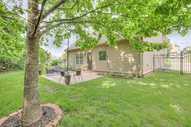 1008 Beverly Ln, Spring Hill, TN 37174 - rear view of house featuring a patio and a shingled roof