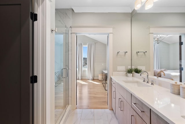 6003B Pennsylvania Ave, Nashville, TN 37209 - ensuite bathroom featuring marble look tiles, vanity, and a shower stall