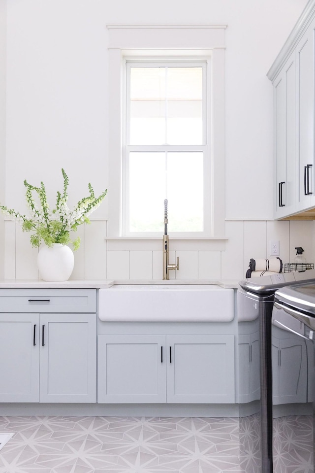 2576 Goose Creek Byp, Franklin, TN 37064 - clothes washing area with cabinet space and washing machine and dryer