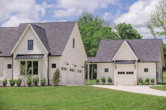 2576 Goose Creek Byp, Franklin, TN 37064 - modern farmhouse style home with a standing seam roof, roof with shingles, concrete driveway, and metal roof