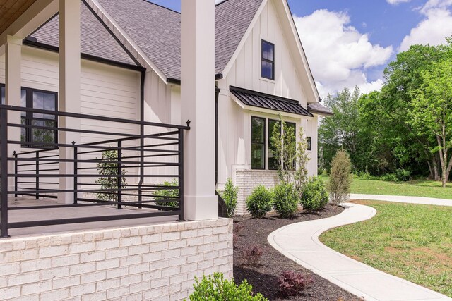 2576 Goose Creek Byp, Franklin, TN 37064 - view of side of home with roof with shingles, a lawn, a chimney, and board and batten siding