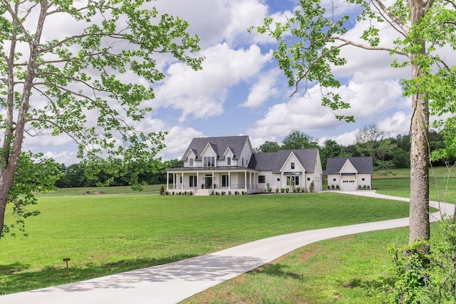 2576 Goose Creek Byp, Franklin, TN 37064 - view of front of house with a front yard, covered porch, and driveway