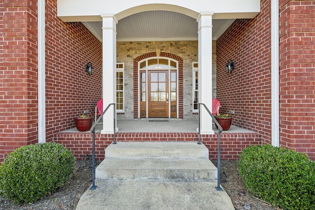 6611 Arno College Grove Rd, College Grove, TN 37046 - property entrance with a porch and brick siding