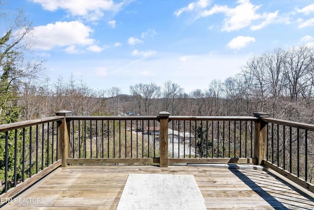 338 Lindsey Mill Cir, Rocky Top, TN 37769 - wooden deck with a forest view