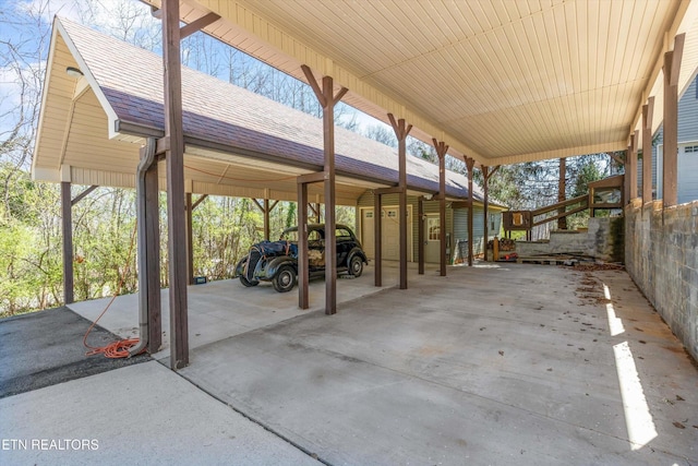338 Lindsey Mill Cir, Rocky Top, TN 37769 - view of parking / parking lot featuring a carport