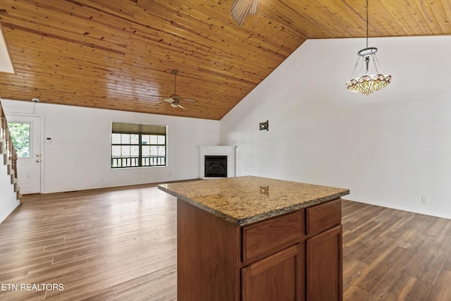 338 Lindsey Mill Cir, Rocky Top, TN 37769 - living area featuring wood ceiling, a ceiling fan, a fireplace, high vaulted ceiling, and wood finished floors