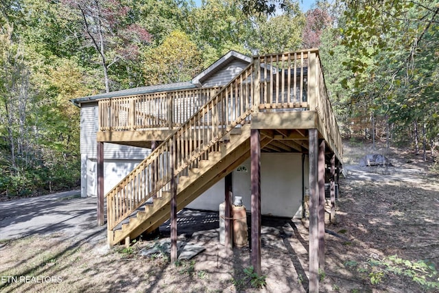 2406 Rowena Ln, Knoxville, TN 37931 - wooden deck with stairway and a garage