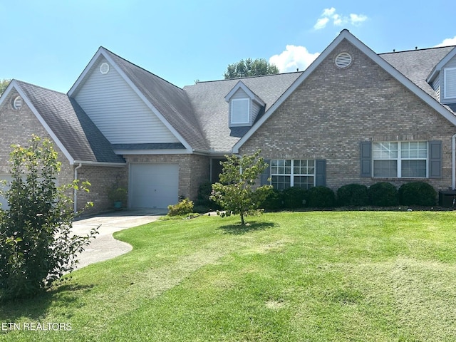 3305 Laurel View Rd, Knoxville, TN 37917 - view of front of property with brick siding, concrete driveway, a front lawn, and an attached garage