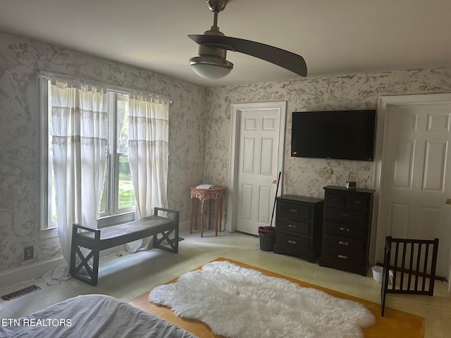1939 Pinewood Cv, Cleveland, TN 37312 - bedroom with wallpapered walls, multiple windows, baseboards, and a ceiling fan