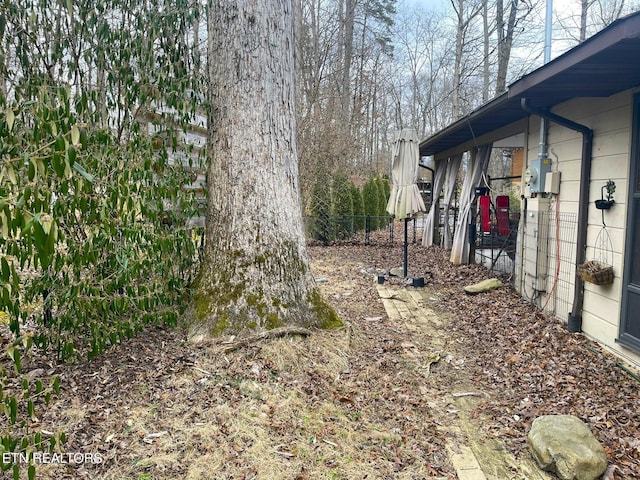 view of yard featuring fence