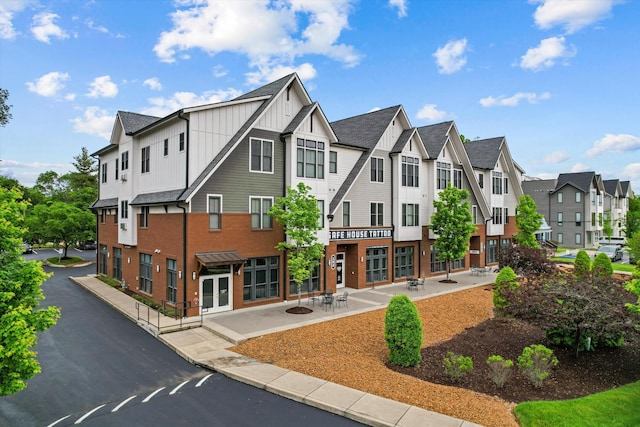 view of property with a residential view