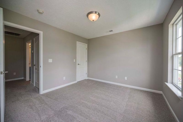 2642 Sewanee Pl, Murfreesboro, TN 37128 - carpeted spare room with plenty of natural light, baseboards, and a smoke detector