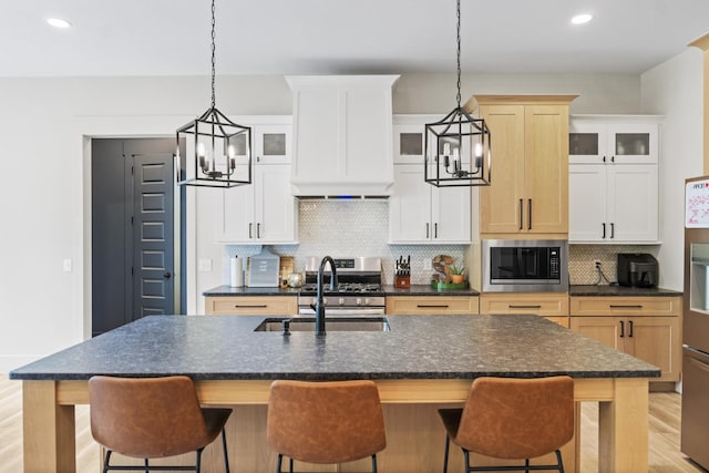 12684 US Highway 41, Tracy City, TN 37387 - kitchen featuring a sink, a chandelier, appliances with stainless steel finishes, recessed lighting, and decorative backsplash