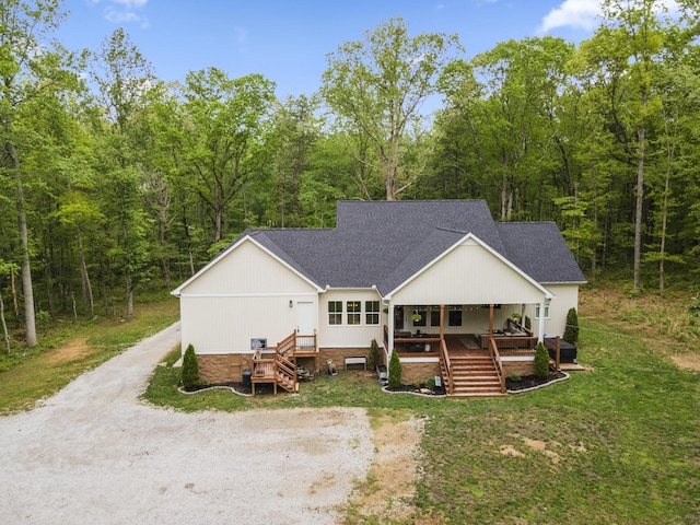 12684 US Highway 41, Tracy City, TN 37387 - view of front of home with roof with shingles, covered porch, stairway, and a view of trees