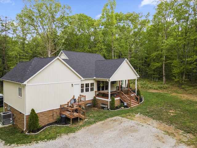 12684 US Highway 41, Tracy City, TN 37387 - rear view of property featuring roof with shingles, central AC, a deck, crawl space, and a forest view
