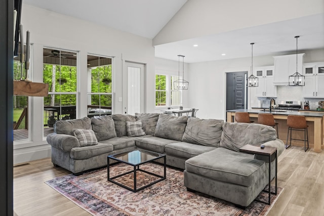 12684 US Highway 41, Tracy City, TN 37387 - living room with a chandelier, light wood finished floors, recessed lighting, and high vaulted ceiling
