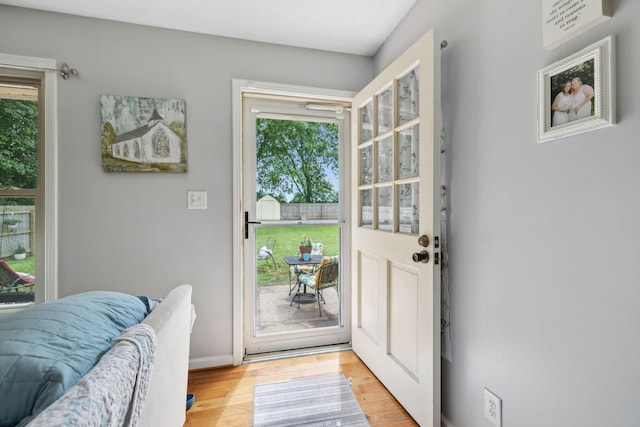 405 Mockingbird Dr, Mount Pleasant, TN 38474 - entryway with plenty of natural light, light wood-style flooring, and baseboards