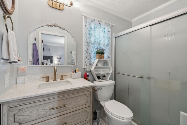 405 Mockingbird Dr, Mount Pleasant, TN 38474 - full bathroom with a stall shower, toilet, a textured ceiling, ornamental molding, and vanity