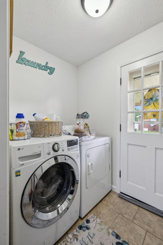405 Mockingbird Dr, Mount Pleasant, TN 38474 - laundry room featuring independent washer and dryer and a textured ceiling