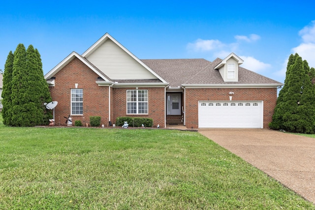 1158 Rock Ledge Pass, Gallatin, TN 37066 - view of front of house featuring brick siding, an attached garage, a front yard, driveway, and roof with shingles