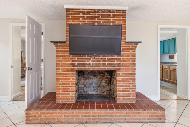 2046 Scribners Mill Rd, Culleoka, TN 38451 - detailed view of a textured ceiling, a brick fireplace, and baseboards