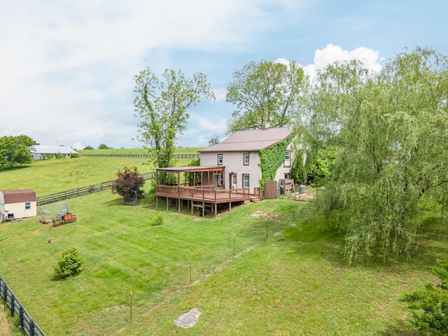 2046 Scribners Mill Rd, Culleoka, TN 38451 - view of yard featuring a wooden deck, a rural view, an outbuilding, and a storage unit