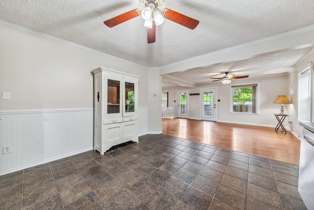 2046 Scribners Mill Rd, Culleoka, TN 38451 - spare room featuring ceiling fan, a textured ceiling, baseboards, and ornamental molding