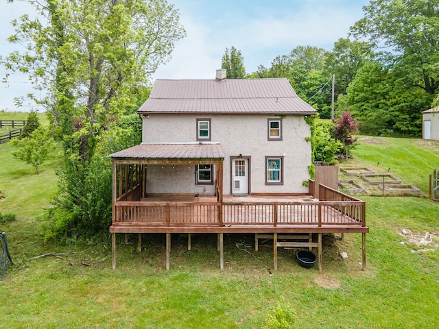 2046 Scribners Mill Rd, Culleoka, TN 38451 - back of property with stucco siding, a yard, a deck, metal roof, and a chimney