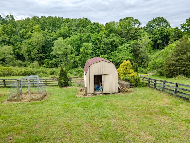 2046 Scribners Mill Rd, Culleoka, TN 38451 - view of shed featuring a wooded view