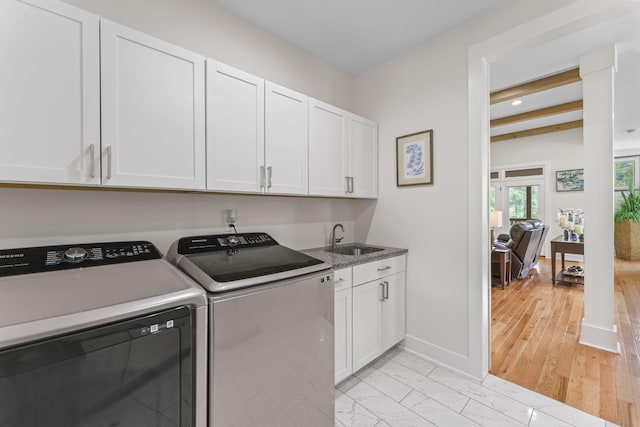 304 Cedar Hollow Ct, Lebanon, TN 37087 - laundry area featuring washer and dryer, cabinet space, baseboards, light marble finish flooring, and recessed lighting