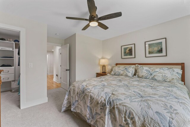 304 Cedar Hollow Ct, Lebanon, TN 37087 - bedroom with carpet, baseboards, a walk in closet, and a ceiling fan