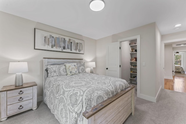 304 Cedar Hollow Ct, Lebanon, TN 37087 - bedroom with baseboards, a spacious closet, a closet, light carpet, and recessed lighting