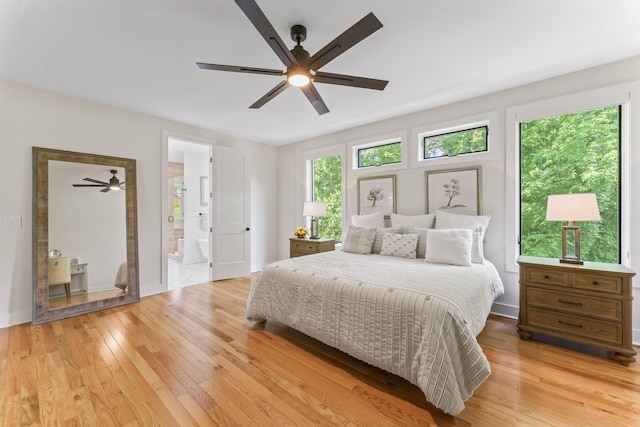304 Cedar Hollow Ct, Lebanon, TN 37087 - bedroom with light wood-type flooring, ensuite bath, and a ceiling fan