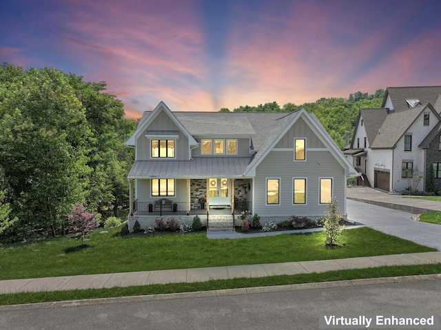 304 Cedar Hollow Ct, Lebanon, TN 37087 - view of front of home with a porch, board and batten siding, a front lawn, and a standing seam roof