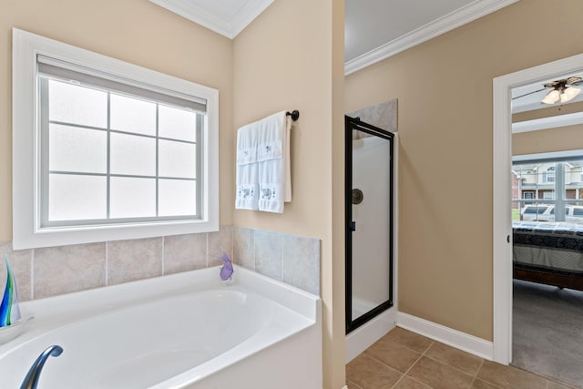 full bathroom with crown molding, plenty of natural light, a stall shower, tile patterned floors, and ensuite bathroom