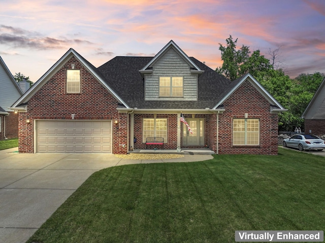 traditional-style house with driveway, a lawn, brick siding, and a shingled roof